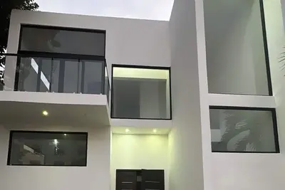 Image de Charming 3bedroom house w/ Ac, WiFi  n  pool in serene gated community in Tulum.