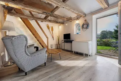Image de Studio 'Die Kajüte' avec terrasse privée et jardin privatif