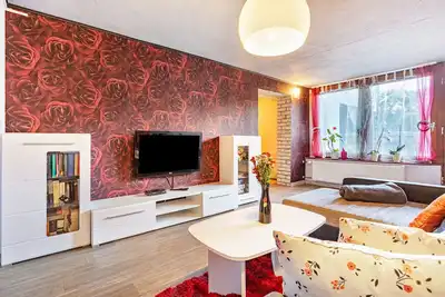 Image de Grande appartement de vacances avec jardin, terrasse privée et Wi-Fi en souplex