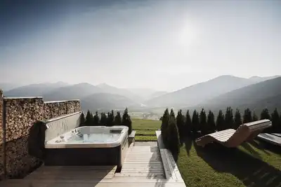 Image de Chalet \"Rueper Hof Dolomit\" avec vue sur la montagne, terrasse privée et Wi-Fi