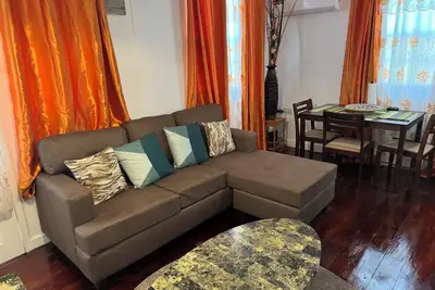 Image de Cozy 2-bedroom house among the trees With WiFi and Ac, Close to a Beach