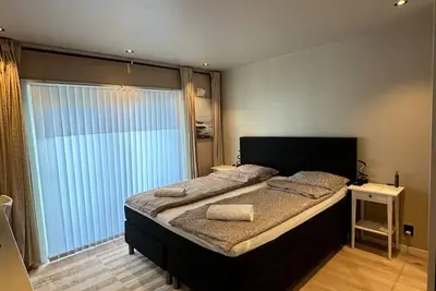 Image de Charming 2-bedroom in sheared apartment in lovely Bergen with WiFi, Ac