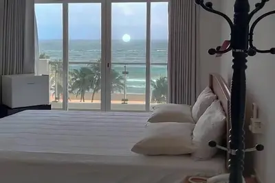 Image de Enjoy a beautiful sunset from your ocean-view bedroom.