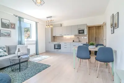 Image de Modern \"ski-to-door\" vacation apartment for 4 guests in the Klínovec ski area