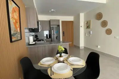 Image de New apartment with all amenities, one minute walking distance to the beach.