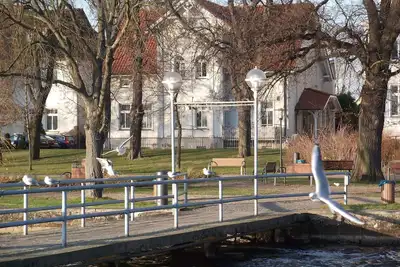 Image de Appartement 'Fewo Villa Zwick An Der Kietzbrücke' avec vue sur le lac, jardin partagé et Wi-Fi