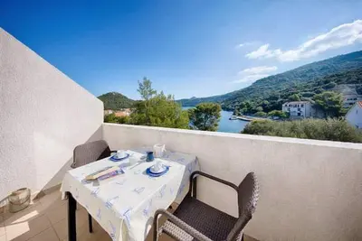 Image de Apartments Bruna Lastovo-Comfort One Bedroom Apartment with Balcony and Sea View-Plavi