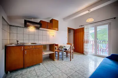 Image de Apartments Malo Lago - One-Bedroom Apartment with Balcony and Sea View - Attic (Apartment 3)