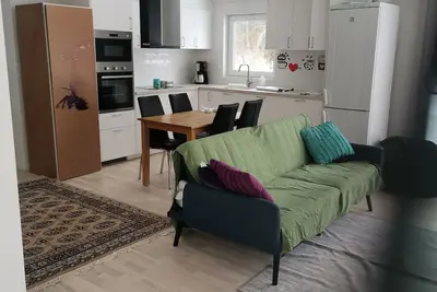 Image de Detta Eleganta Boende är Perfekt för Gruppresor. med 4 Säng