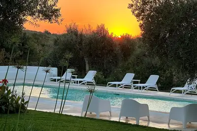 Image de Trullo with swimming pool gym and garden with lawn all fenced