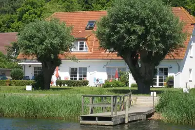 Image de Fährhaus Nr. 12 - House with lake view, free use of sauna and swimming pool -