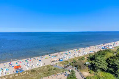 Image de Vacation apartment with private sauna and fireplace, right on the beach.