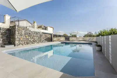 Image de Villa 'Badimà - Con Piscina' avec vue sur la mer, Wi-Fi et climatisation