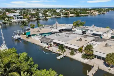 Image de Canal-Front Home with Dock and Walk to Beach