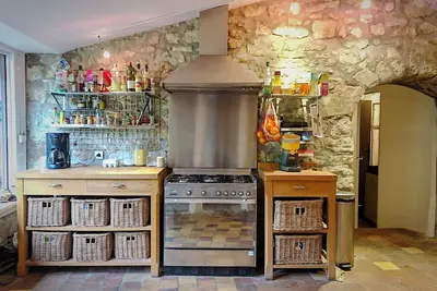 Image de Bucolique moulin restauré avec piscine intérieure dans Le Perche