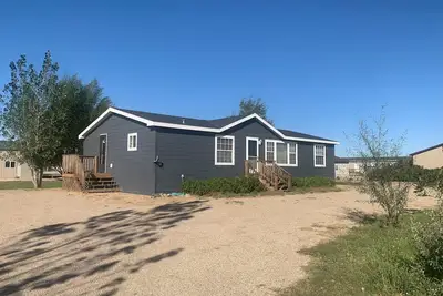 Image de Beautiful and cozy 3 bedroom home, perfect for a family get away.