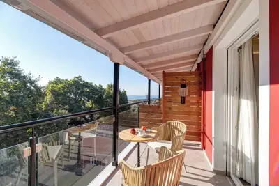 Image de Chambre 'Deluxe Loft - B' avec Terrasse partagée, Wi-Fi et Climatisation