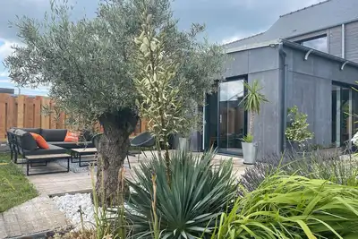 Image de Maison de vacances 'L'Escapade Du Bord De Rance' avec terrasse, jardin et Wi-Fi
