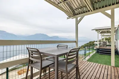 Image de Mobile Home 'Ciclamino' avec vue sur le lac, Wi-Fi et climatisation