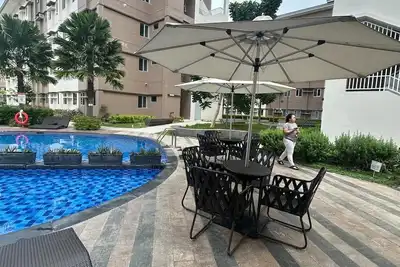 Image de Cozy1-bedroom condo with Ac and WiFi in Smdc Marilao, nearby Sm Mall & Ph Arena