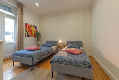 Image de Plumeria - Appartement 75m2 - Au calme - Parking Public Gratuit - 2 Chambres