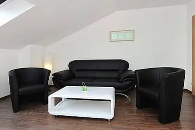 Image de Ferienwohnung Black Pearl - Haus Hafenromantik in Neuharlingersiel