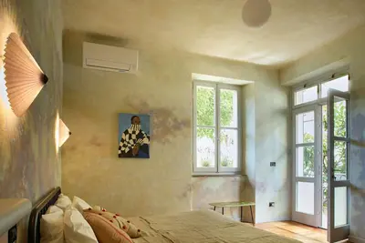 Image de Zelda. In the center of Udine charming apartment of 1930s architecture.