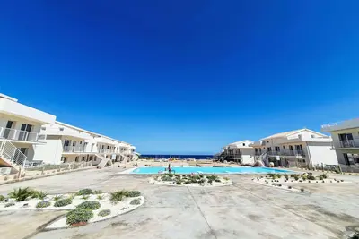 Image de Bel appartement pour 4 personnes avec climatisation, piscine, Wifi, Tv, terrasse et parking