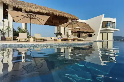 Image de 7-bedroom villa in delightful Manzanillo with WiFi, Ac. Start your vacation now