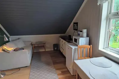 Image de Island house room Shared entrance with hosts Two single beds + sofa bed Small kitchen