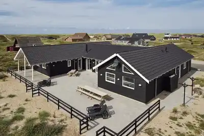 Beautiful vacation home with indoor pool and large activity room near Harboøre.