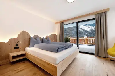Image de Appartement 'Chalet Tribulaun - Apt 2' avec vue sur les montagnes, terrasse privée et Wi-Fi