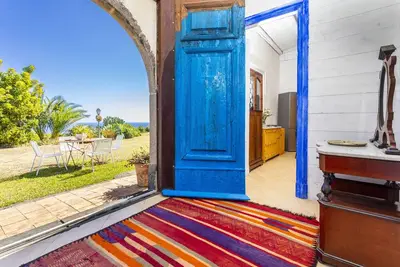 Image de Appartement 'La Casa Del Fico D'india - Blu' avec jardin partagé, Wi-Fi et climatisation