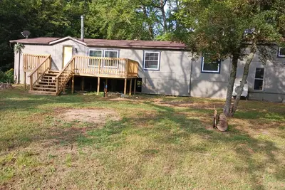 Image de Spacious 4-bedroom mobile home 40 acres on Baron Fork 10 miles from Tahlequah