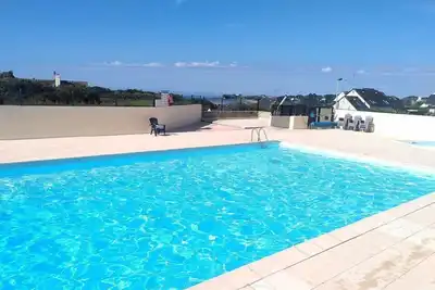Image de Maisonnette 2 pièces Mezz. 4 personnes avec piscine extérieure commune