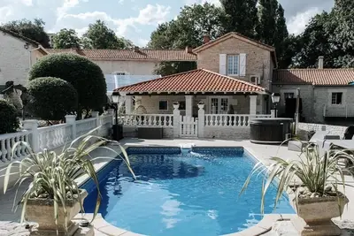 Charming updated and 4-bedroom mill house on the river with fantastic views.