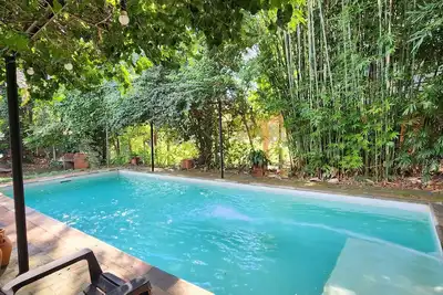 Image de Oasis in the city, in a splendid green setting, total relaxation for the family.