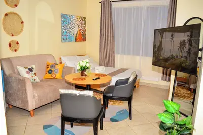 Spacious studio unit in Ruiru: peaceful & secure with free parking & fast wifi