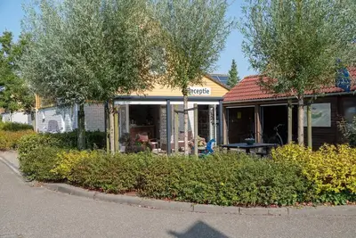 Image de Maison de vacances à Zeeland avec jardin