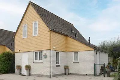 Image de Maison de vacances à Zeeland avec jardin