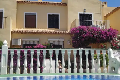 Image de South facing, overlooking the pool. \n9 minutes walk to La Zenia beach.