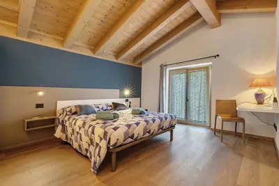 Image de Maison de vacances 'Appartamento Indaco' avec vue sur les montagnes, terrasse privée et Wi-Fi