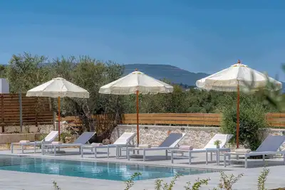 Image de Luxury villa located in a quiet place just 5min away from the Beach & Center \n