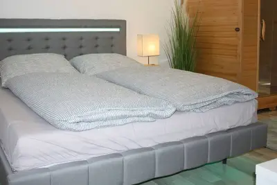 Image de Wellness apartment no. 2 with infrared sauna - wallbox - Netflix - Wlan