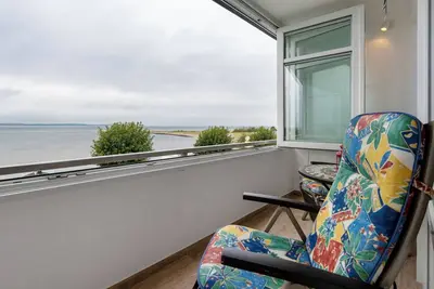 Image de Appartement 'Förde-Traumblick 2' avec vue sur la mer, balcon et Wi-Fi