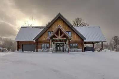 Image de Chalet luxueux  en bois rond: bord de l’eau+spa