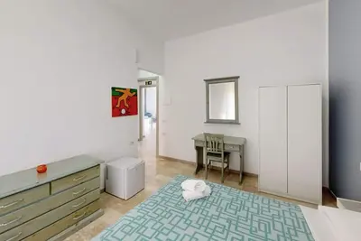 Image de Chambre \"Camera Girasole\" avec Wi-Fi et climatisation