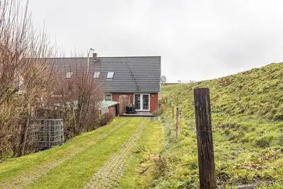 Image de Appartement \"Ferienwohnung Deich\" avec jardin privé et Wi-Fi