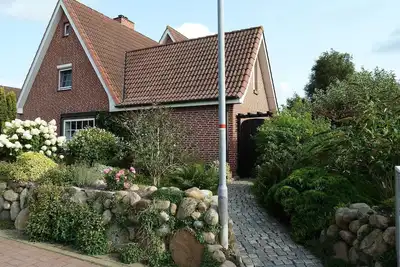Image de Appartement 'Haus Am Delfen' avec terrasse partagée, jardin partagé et Wi-Fi