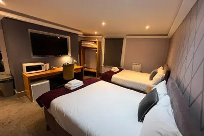 Image de Room 1 Executive Quad Private Bathroom With Street View